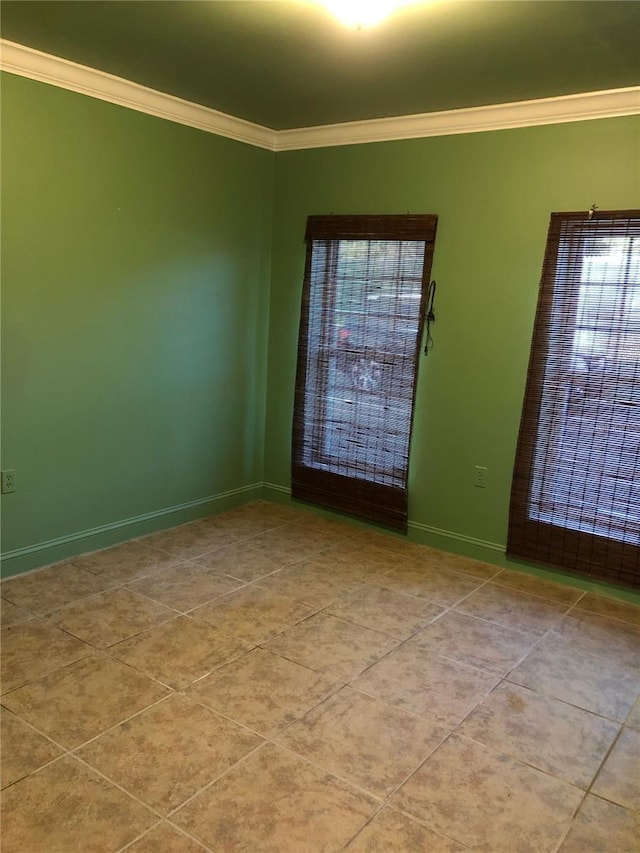 1910 NW 13th Pl, Ocala, FL 34475 - empty room with crown molding and tile patterned flooring