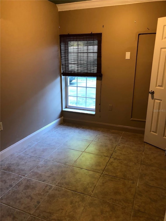 1910 NW 13th Pl, Ocala, FL 34475 - unfurnished room featuring ornamental molding and tile patterned floors