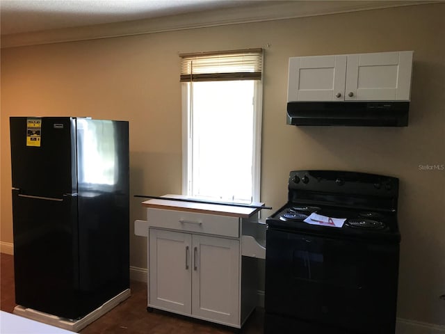1910 NW 13th Pl, Ocala, FL 34475 - kitchen featuring black appliances, under cabinet range hood, and dark wood finished floors