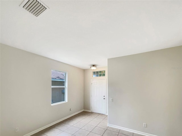 10429 Avelar Ridge Dr, Riverview, FL 33578 - unfurnished room featuring light tile patterned floors and baseboards