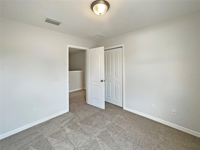 10429 Avelar Ridge Dr, Riverview, FL 33578 - unfurnished bedroom with carpet floors and a closet