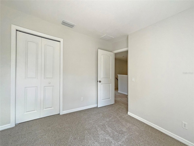 10429 Avelar Ridge Dr, Riverview, FL 33578 - unfurnished bedroom featuring carpet flooring and a closet
