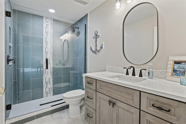 4650 Links Village Dr Unit B103, Ponce Inlet, FL 32127 - full bathroom featuring vanity and a stall shower