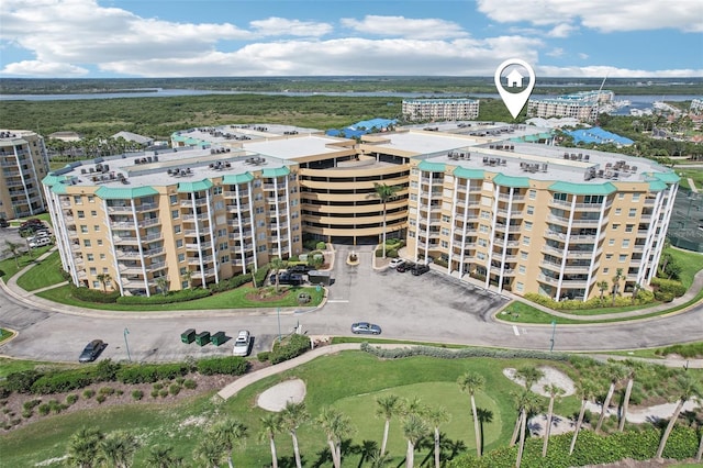 4650 Links Village Dr Unit B103, Ponce Inlet, FL 32127 - drone / aerial view of apartment complex / building and a nearby body of water