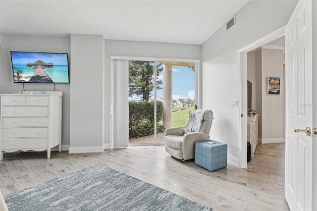 4650 Links Village Dr Unit B103, Ponce Inlet, FL 32127 - living area featuring light wood-type flooring