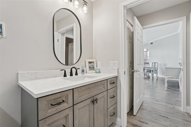 4650 Links Village Dr Unit B103, Ponce Inlet, FL 32127 - bathroom featuring vanity and wood finished floors