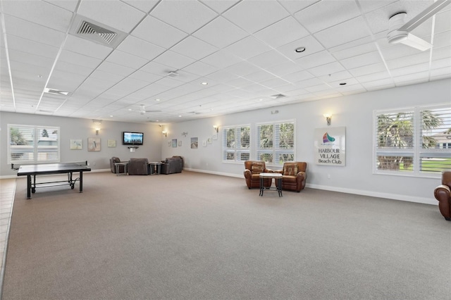 4650 Links Village Dr Unit B103, Ponce Inlet, FL 32127 - living area featuring carpet floors, plenty of natural light, a drop ceiling, and recessed lighting
