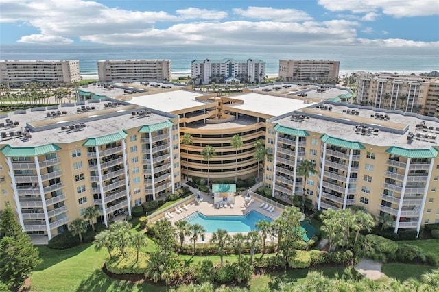 4650 Links Village Dr Unit B103, Ponce Inlet, FL 32127 - view of urban area featuring a nearby body of water and a pool area