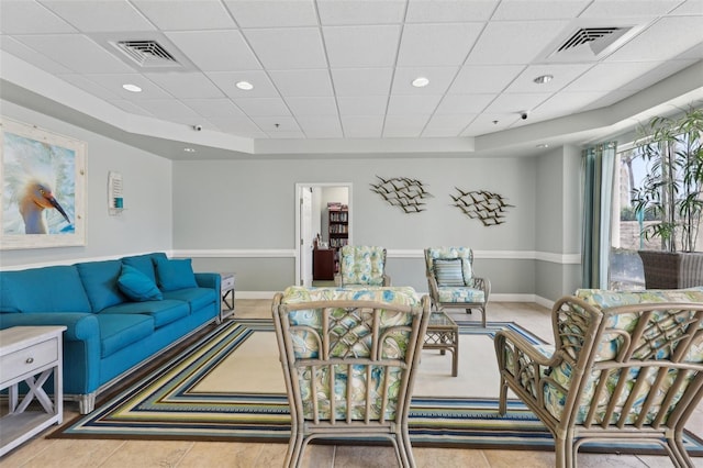 4650 Links Village Dr Unit B103, Ponce Inlet, FL 32127 - living room featuring a paneled ceiling and recessed lighting