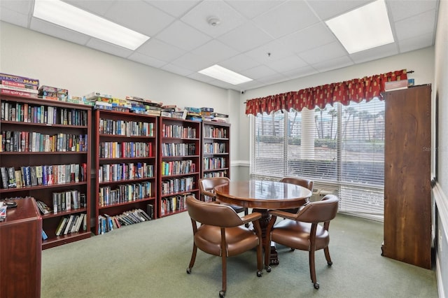 4650 Links Village Dr Unit B103, Ponce Inlet, FL 32127 - dining room featuring carpet and a paneled ceiling