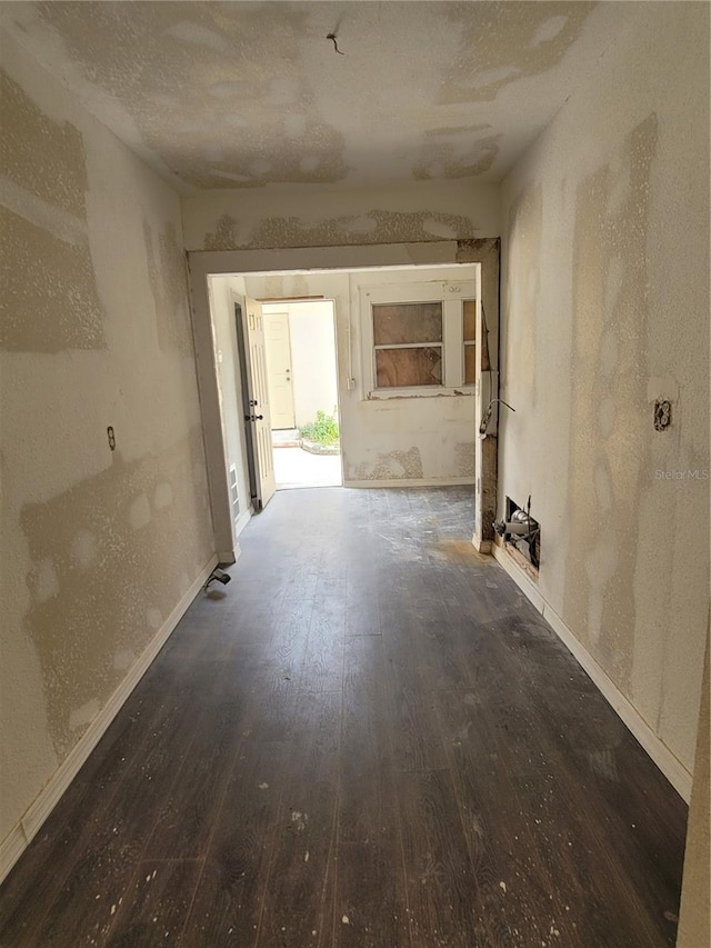 1020 E Main St, Haines City, FL 33844 - corridor with hardwood / wood-style floors and a textured ceiling