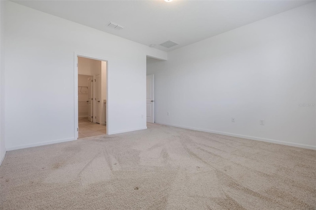 3240 Canna Lily Pl, Clermont, FL 34711 - unfurnished bedroom featuring carpet flooring and connected bathroom