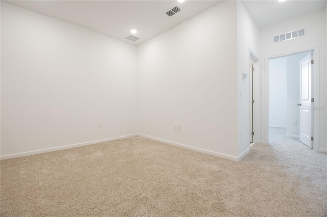 3240 Canna Lily Pl, Clermont, FL 34711 - empty room featuring light carpet and recessed lighting