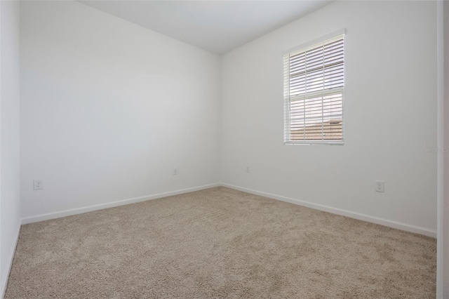 3240 Canna Lily Pl, Clermont, FL 34711 - carpeted spare room with baseboards