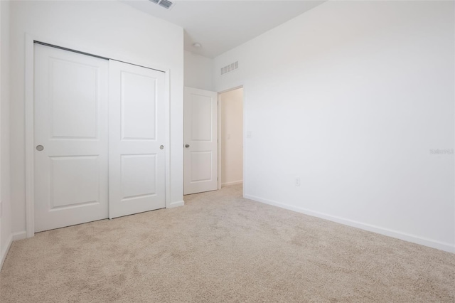 3240 Canna Lily Pl, Clermont, FL 34711 - unfurnished bedroom with carpet flooring and a closet