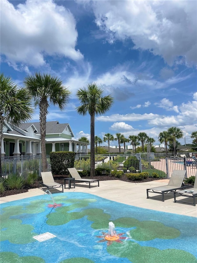 3240 Canna Lily Pl, Clermont, FL 34711 - view of community featuring a swimming pool