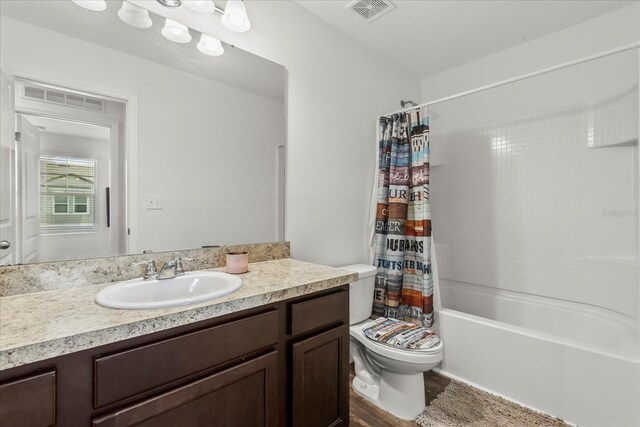 827 Grandin St, Davenport, FL 33837 - full bathroom with vanity and shower / bathtub combination with curtain