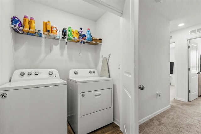 827 Grandin St, Davenport, FL 33837 - laundry area featuring washing machine and dryer and carpet floors