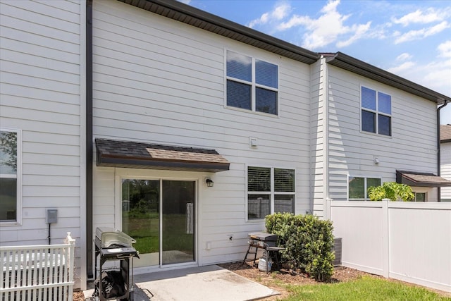 827 Grandin St, Davenport, FL 33837 - back of property featuring a patio area