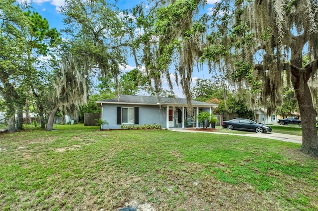 1000 Sal St, Ocoee, FL 34761 - ranch-style house with stucco siding and driveway