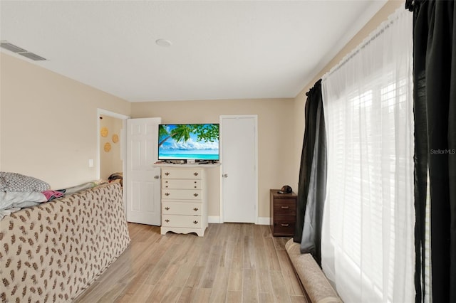 1000 Sal St, Ocoee, FL 34761 - bedroom with light wood-style flooring