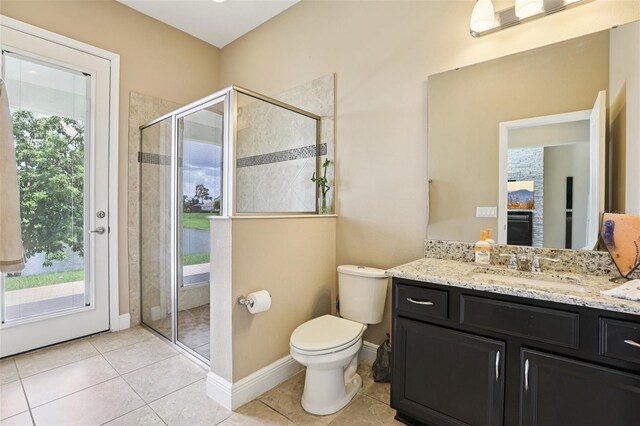 9207 Busaco Park Way, Winter Garden, FL 34787 - bathroom with vanity, a shower stall, and tile patterned flooring