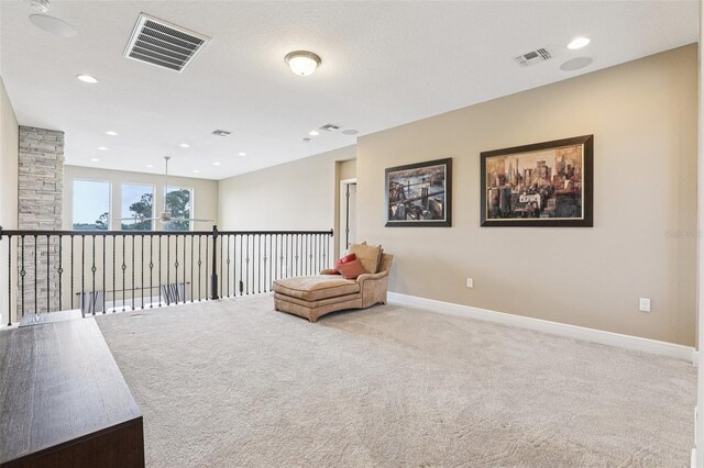 9207 Busaco Park Way, Winter Garden, FL 34787 - living area with carpet flooring and recessed lighting