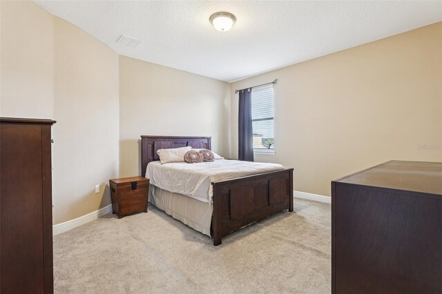 9207 Busaco Park Way, Winter Garden, FL 34787 - bedroom with light carpet
