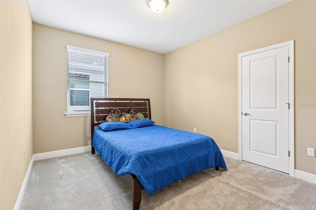 9207 Busaco Park Way, Winter Garden, FL 34787 - bedroom with carpet floors and baseboards