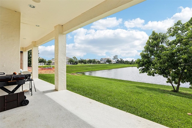 9207 Busaco Park Way, Winter Garden, FL 34787 - view of patio with a water view