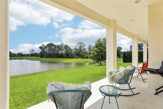 9207 Busaco Park Way, Winter Garden, FL 34787 - view of patio / terrace featuring a water view