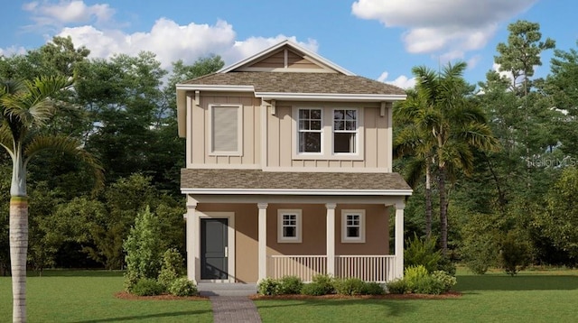 2074 Rider Rain Ln, Apopka, FL 32703 - view of front of house with covered porch, board and batten siding, a front lawn, and a shingled roof