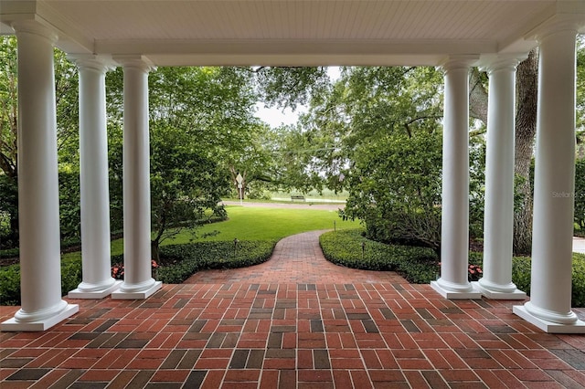 1011 Lake Davis Dr, Orlando, FL 32806 - covered porch featuring a yard