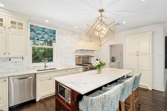 1011 Lake Davis Dr, Orlando, FL 32806 - kitchen with stainless steel appliances, backsplash, a chandelier, light stone counters, and recessed lighting