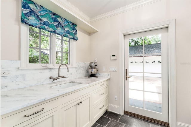 1011 Lake Davis Dr, Orlando, FL 32806 - bar featuring crown molding, plenty of natural light, and backsplash