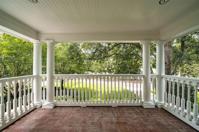 1011 Lake Davis Dr, Orlando, FL 32806 - view of patio / terrace featuring view of wooded area