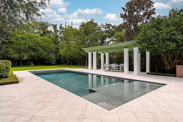 1011 Lake Davis Dr, Orlando, FL 32806 - swimming pool with a patio area, a pergola, and view of scattered trees
