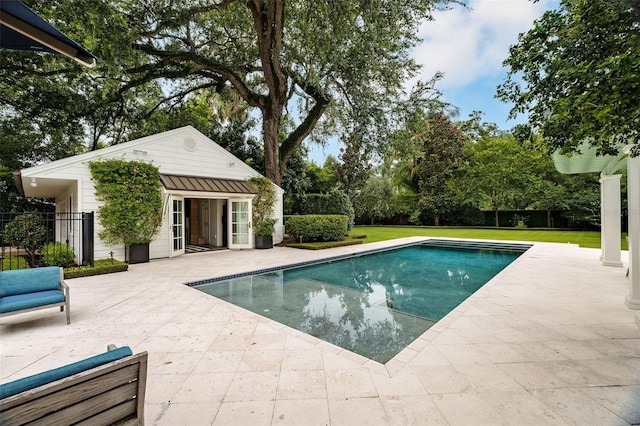 1011 Lake Davis Dr, Orlando, FL 32806 - view of pool with an exterior structure, an outdoor structure, and a patio area