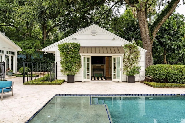 1011 Lake Davis Dr, Orlando, FL 32806 - view of swimming pool featuring a storage structure, an outdoor structure, and a patio