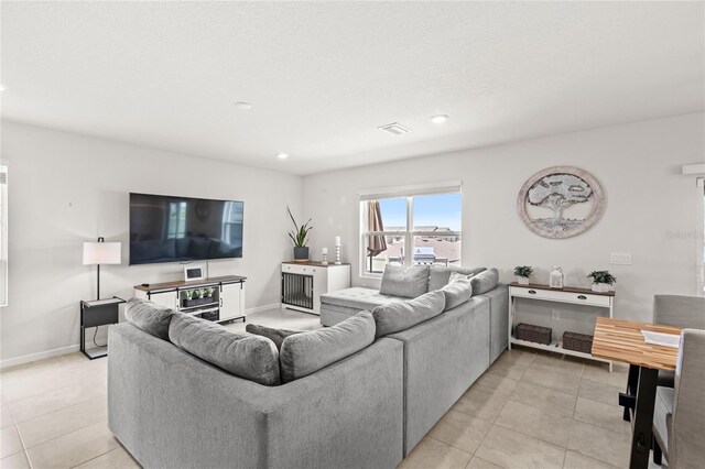 7603 Taormina Way, Clermont, FL 34714 - living area with light tile patterned floors and recessed lighting
