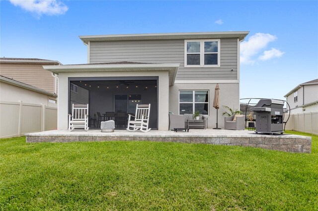 7603 Taormina Way, Clermont, FL 34714 - rear view of property with a patio area, a fenced backyard, a sunroom, and an outdoor living space