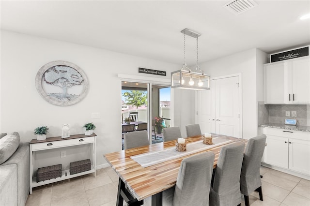 7603 Taormina Way, Clermont, FL 34714 - dining room with light tile patterned floors