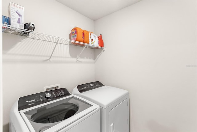 7603 Taormina Way, Clermont, FL 34714 - laundry area featuring washer and dryer