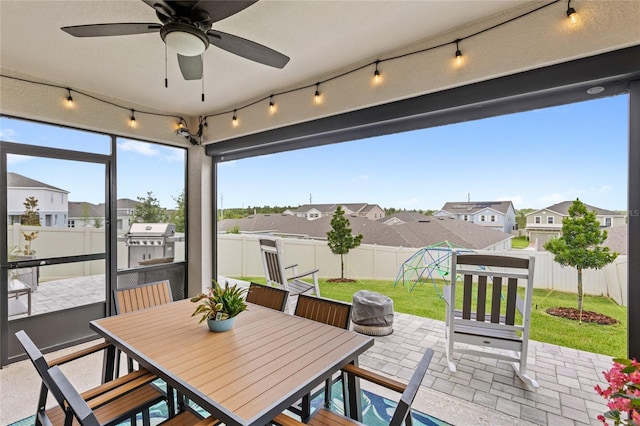 7603 Taormina Way, Clermont, FL 34714 - fenced backyard featuring a patio area, a residential view, a ceiling fan, and outdoor dining space