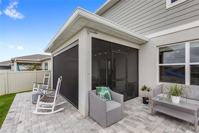 7603 Taormina Way, Clermont, FL 34714 - view of patio with a sunroom