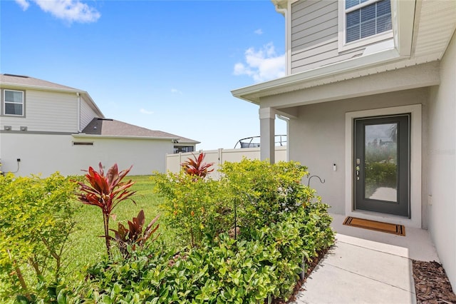 7603 Taormina Way, Clermont, FL 34714 - property entrance with stucco siding