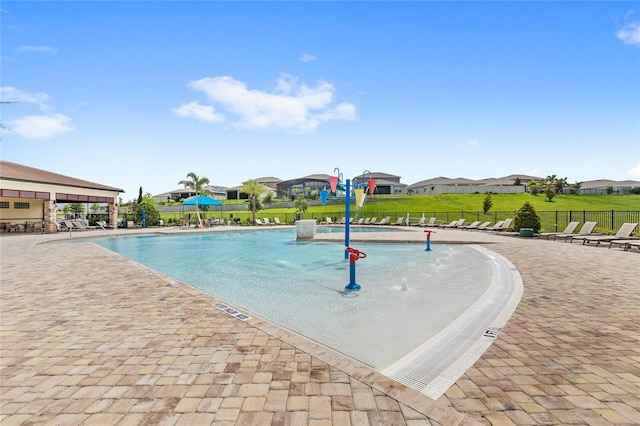 7603 Taormina Way, Clermont, FL 34714 - community pool with a patio and a residential view