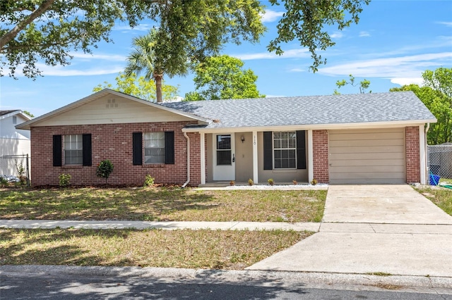 110 Rabun Ct, Sanford, FL 32773 - single story home with an attached garage, concrete driveway, and brick siding