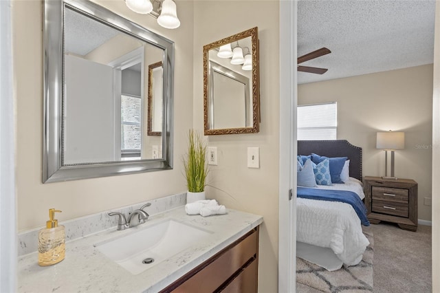 110 Rabun Ct, Sanford, FL 32773 - bathroom featuring vanity, a ceiling fan, a textured ceiling, and ensuite bathroom