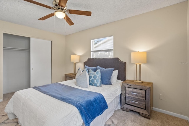 110 Rabun Ct, Sanford, FL 32773 - bedroom with light carpet, a closet, a textured ceiling, and ceiling fan